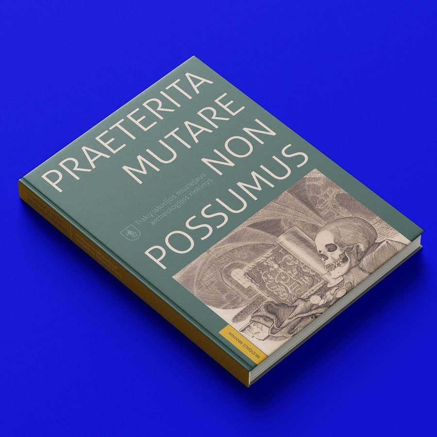 Hardcover book titled “Praeterita Mutare Non Possumus” with large typography and an illustration of a skeleton reading a book, placed on a vivid blue background.