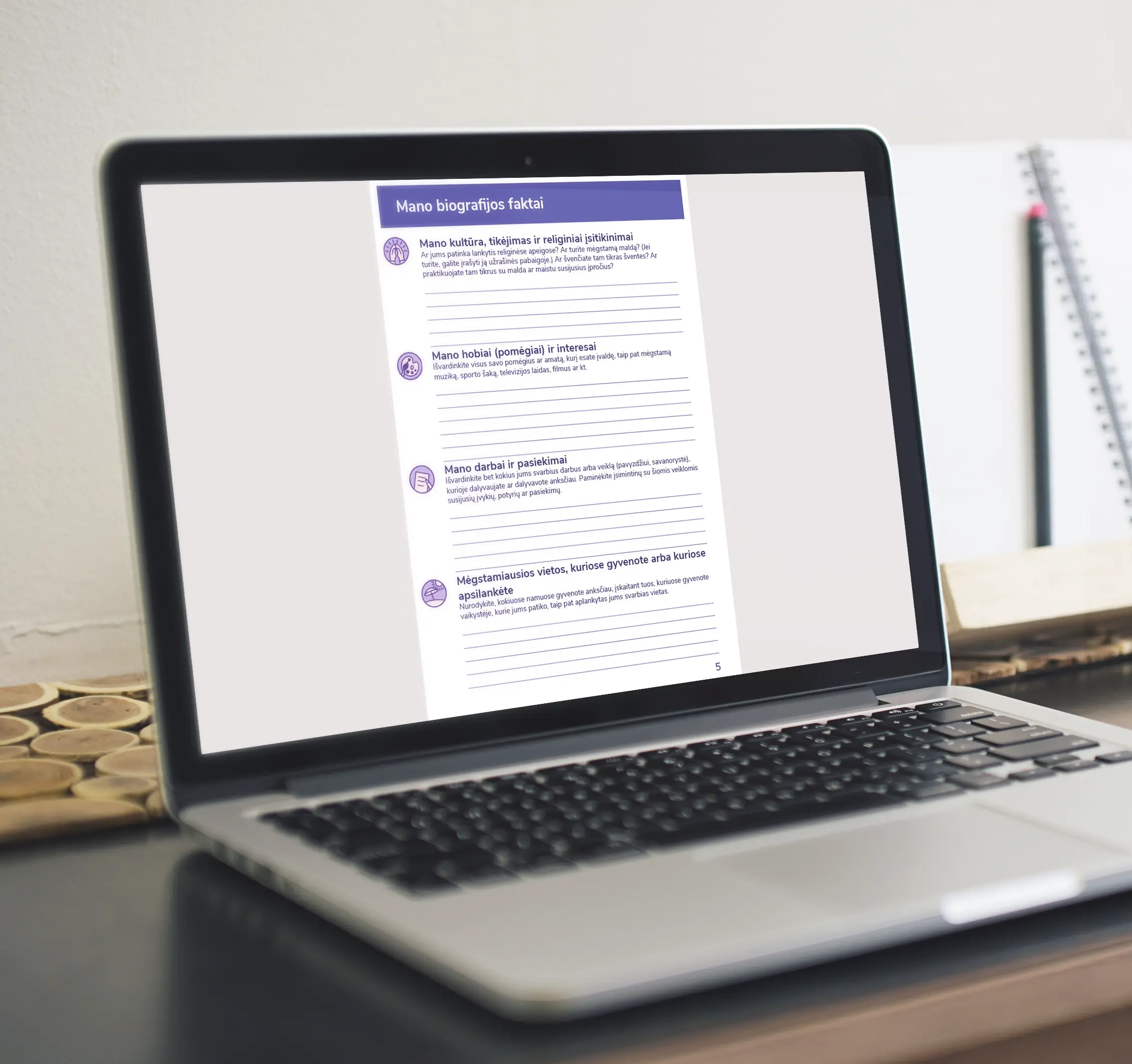 A laptop displaying a page from an interactive PDF form titled “My Biography Facts,” with fillable fields for personal background, cultural beliefs, hobbies, interests, achievements and favourite places.