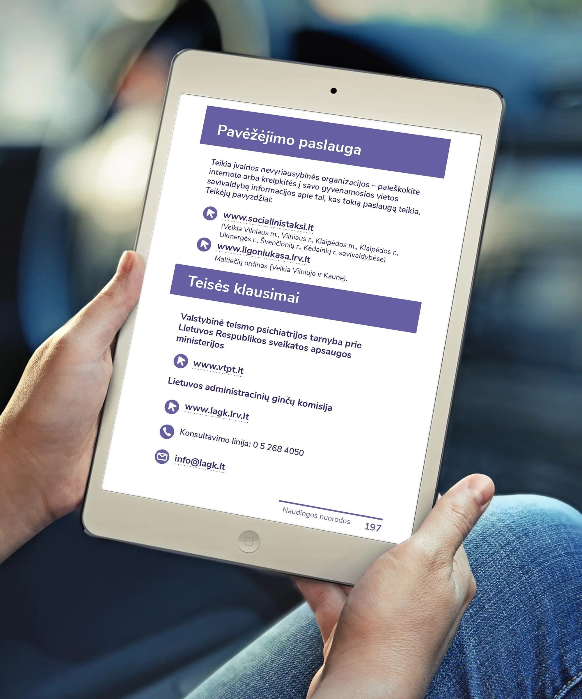 A tablet displaying a page from the accessible PDF guide, featuring information about transportation services, legal assistance and useful contact details, with purple headings and link icons.
